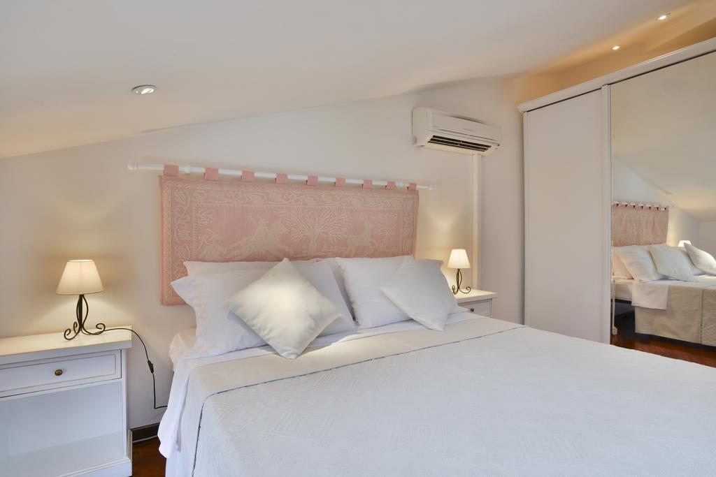 Holiday Alghero Apartment Стая снимка